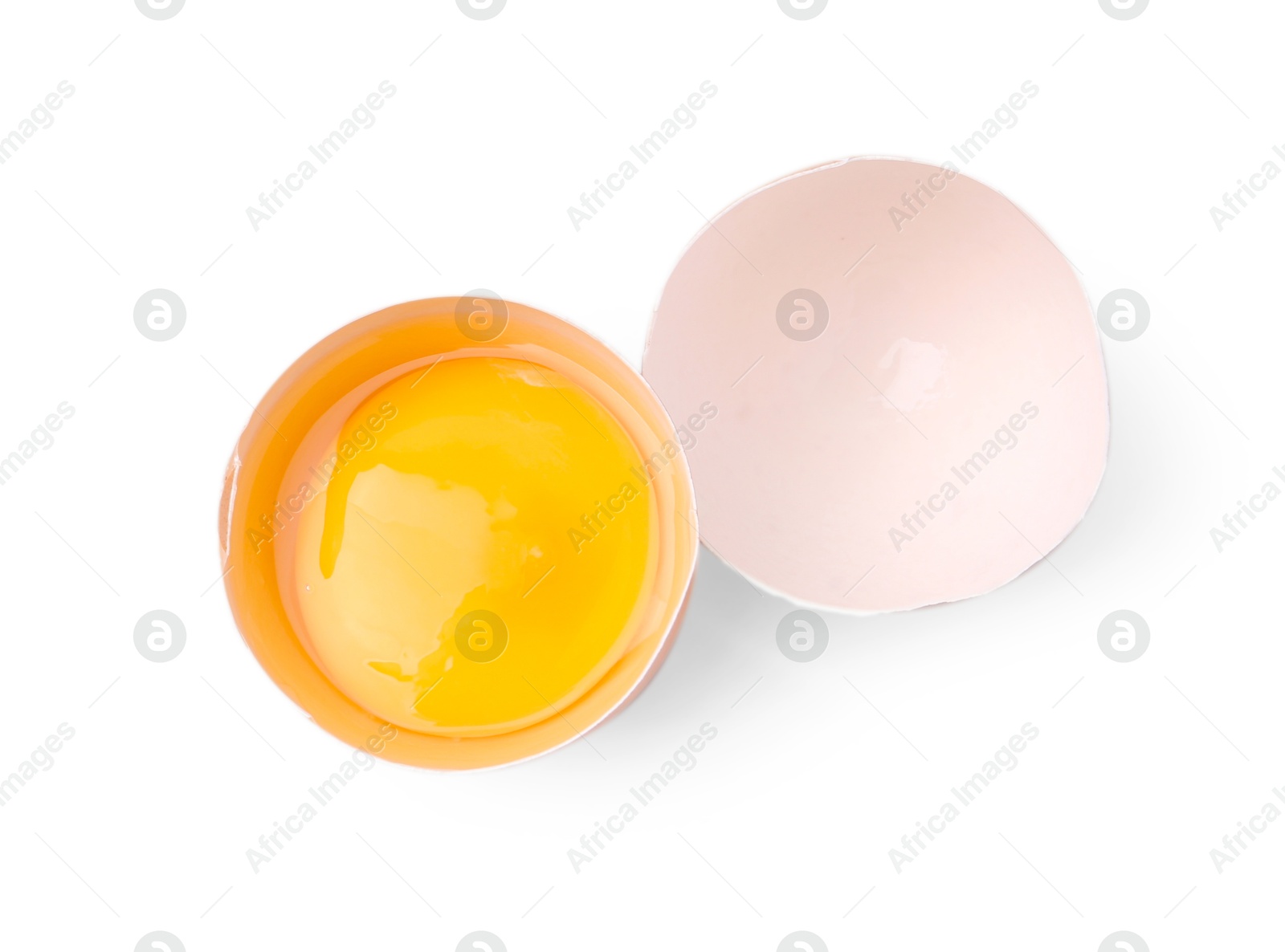 One broken chicken egg isolated on white, top view Photo of One broken chicken egg isolated on white, top view