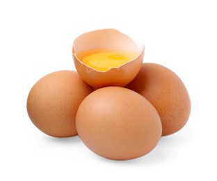 Photo of Whole and broken chicken eggs isolated on white