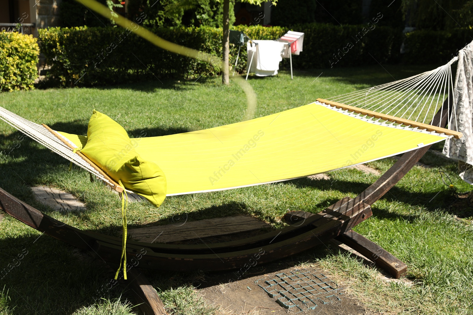 Photo of Comfortable hammock in garden on sunny day