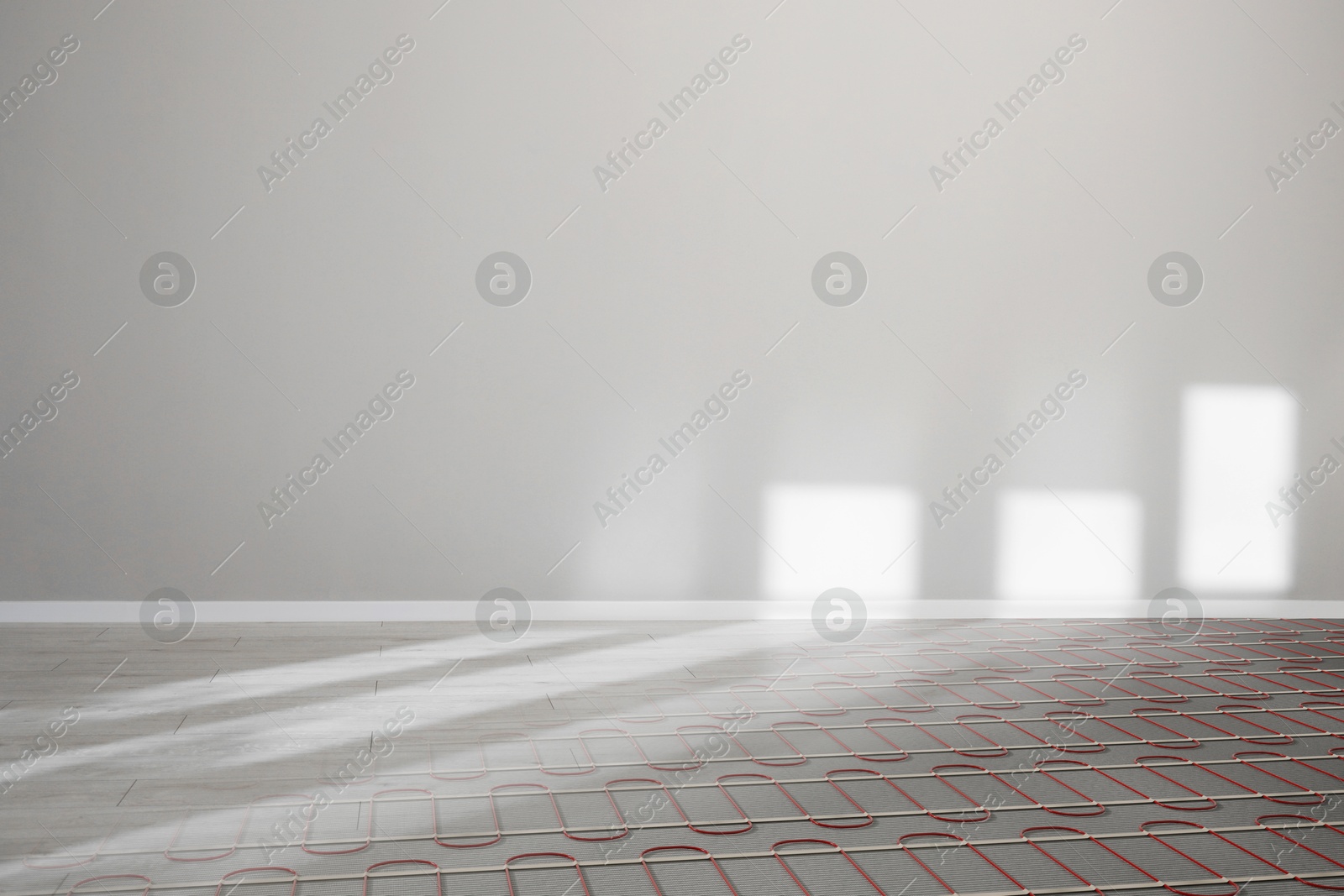 Underfloor heating system seen through laminate, double exposure Image of Underfloor heating system seen through laminate, double exposure