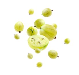 Image of Fresh green gooseberries in air against white background