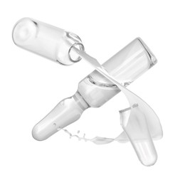 Image of Ampoules and splash of medical or cosmetic liquid in air against white background