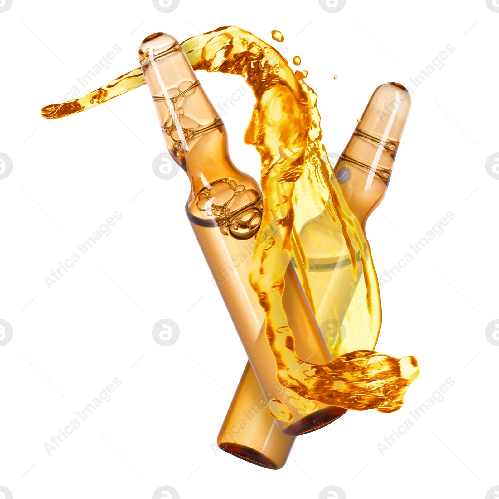 Ampoules and splash of medical or cosmetic liquid in air against white background Image of Ampoules and splash of medical or cosmetic liquid in air against white background