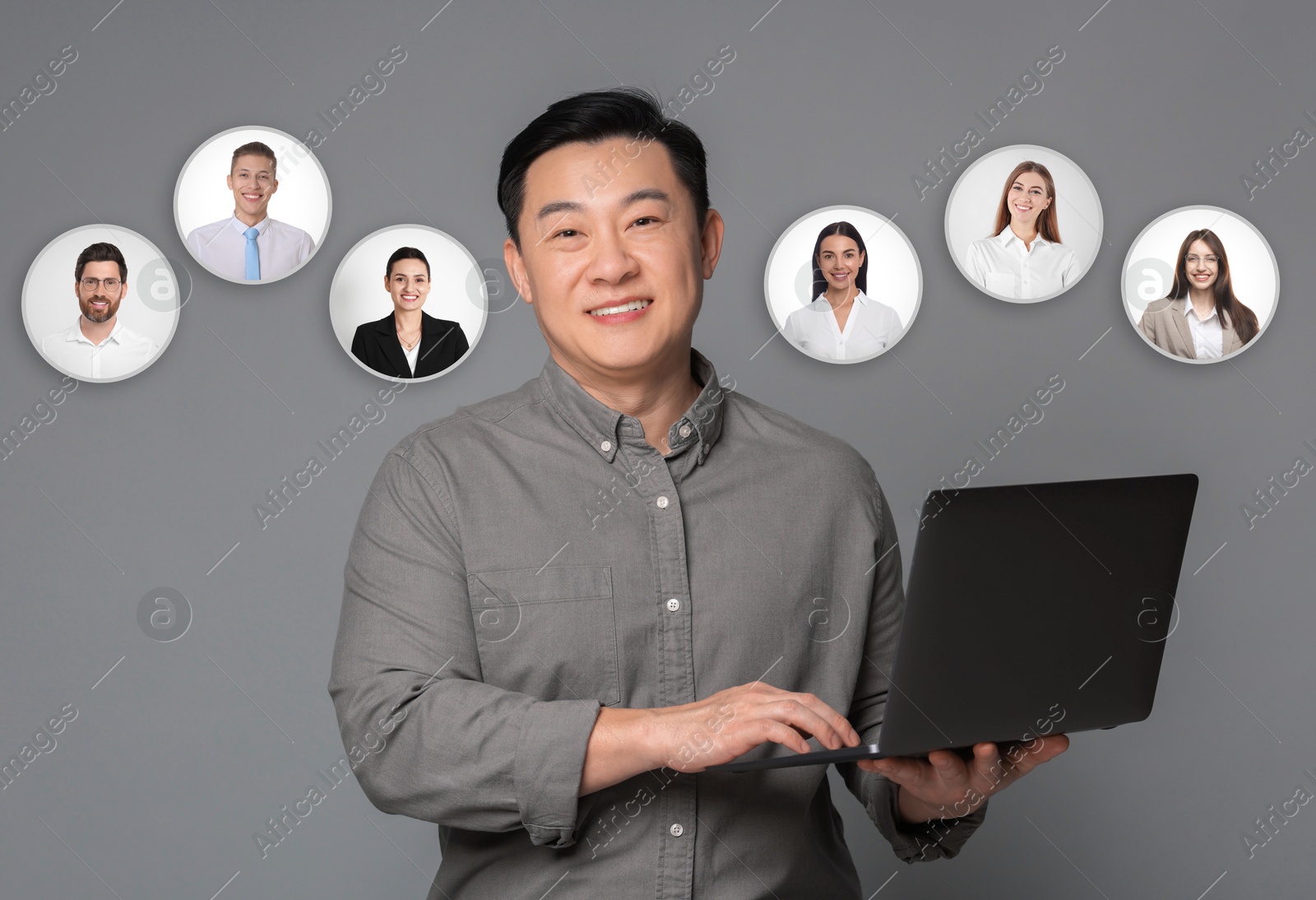 Image of Recruiter with laptop looking for employee against grey background. Photos of candidates near him. Human resources management