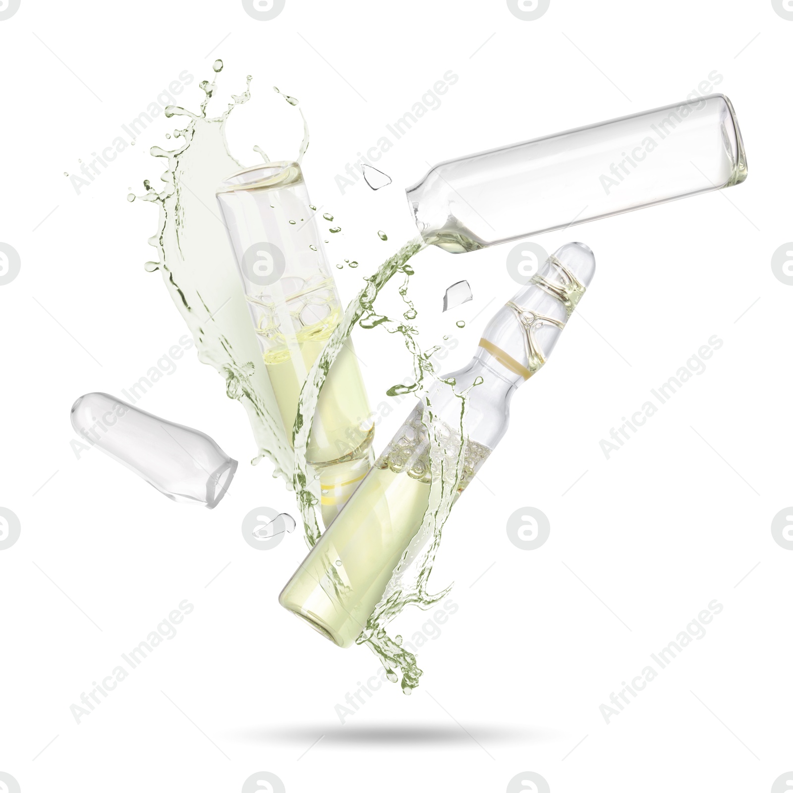 Ampoules and splash of medical or cosmetic liquid in air against white background Image of Ampoules and splash of medical or cosmetic liquid in air against white background