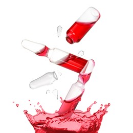 Image of Ampoules and splash of medical or cosmetic liquid in air against white background