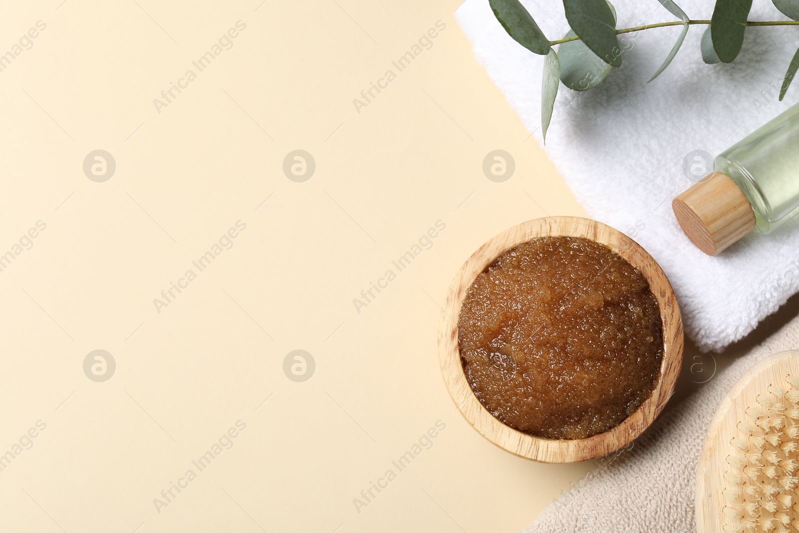 Natural body scrub and ingredients on beige table, flat lay. Space for text Photo of Natural body scrub and ingredients on beige table, flat lay. Space for text