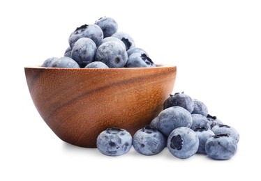 Photo of Many frozen blueberries in bowl isolated on white