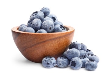 Photo of Many frozen blueberries in bowl isolated on white