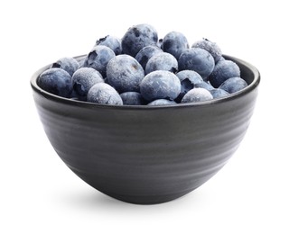 Photo of Many frozen blueberries in bowl isolated on white