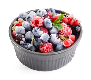Photo of Many different frozen berries and mint in isolated on white