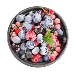 Photo of Many different frozen berries and mint in isolated on white, top view