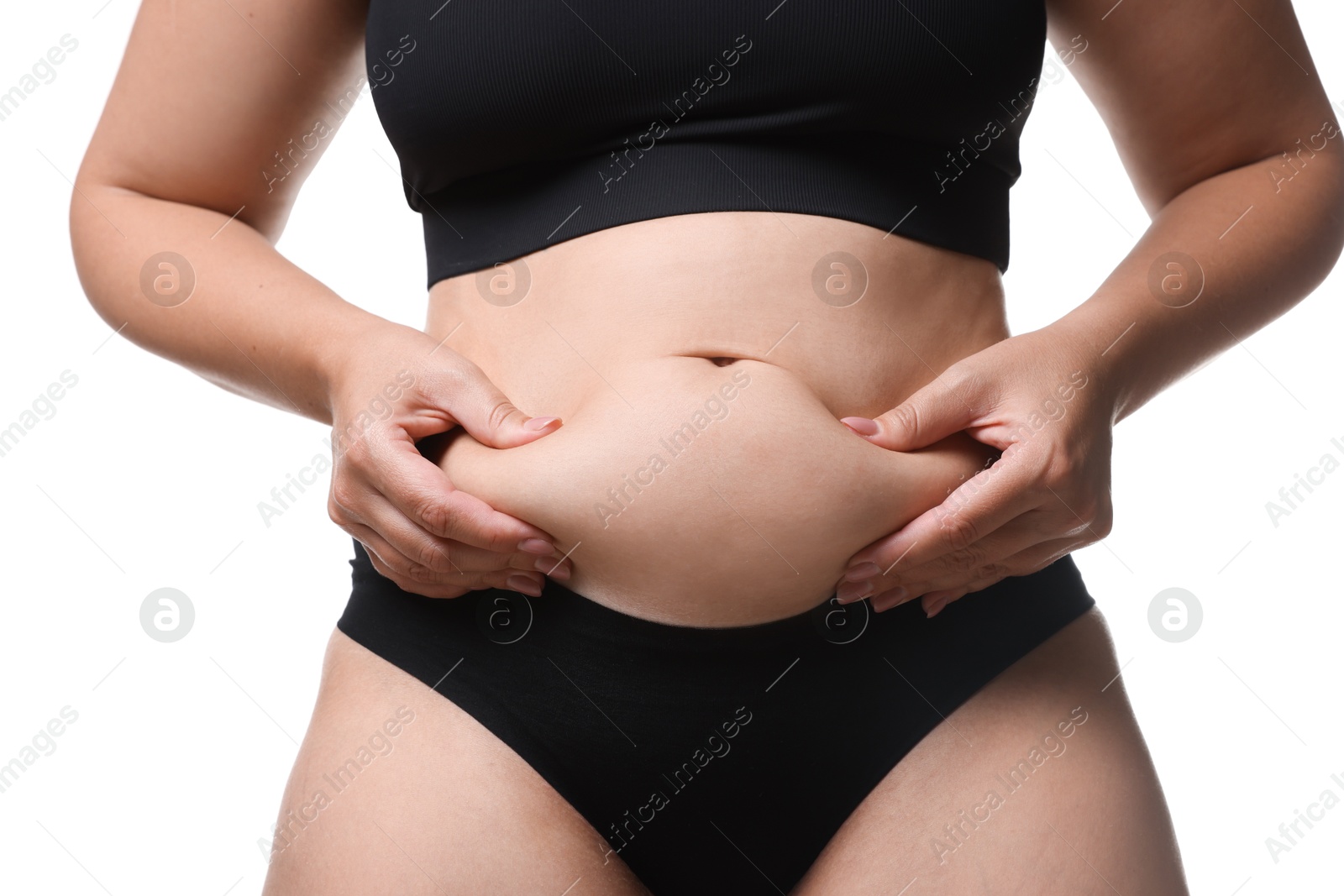 Photo of Liposuction. Woman in underwear touching her belly on white background, closeup