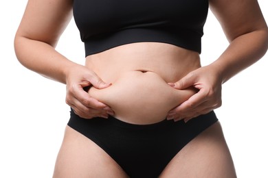 Photo of Liposuction. Woman in underwear touching her belly on white background, closeup
