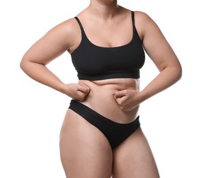 Photo of Liposuction. Woman in underwear touching her belly on white background, closeup