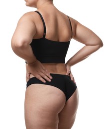 Photo of Liposuction. Woman in underwear on white background, back view