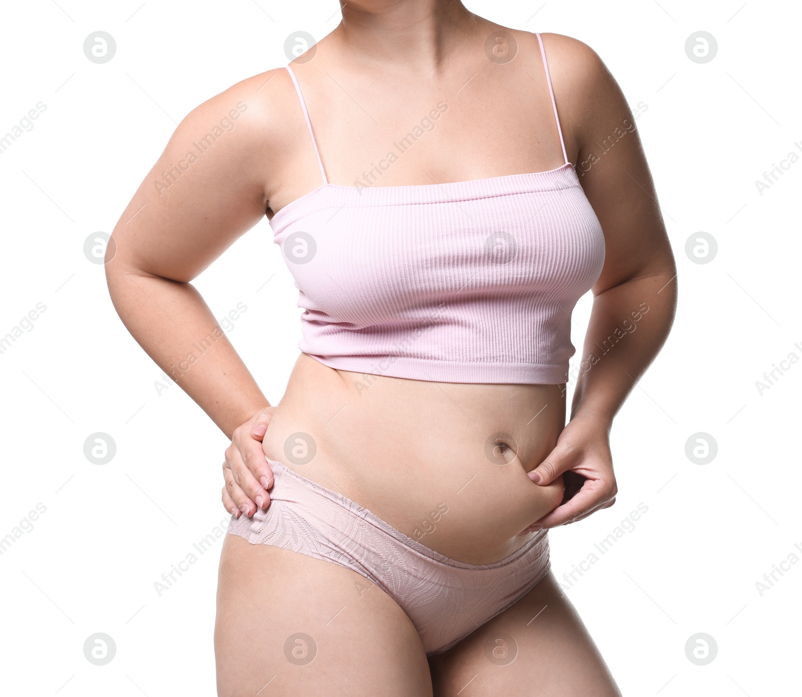 Liposuction. Woman in underwear touching her belly on white background, closeup Photo of Liposuction. Woman in underwear touching her belly on white background, closeup