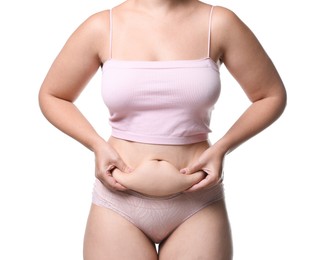 Photo of Liposuction. Woman in underwear touching her belly on white background, closeup