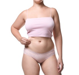 Photo of Liposuction. Woman in underwear touching her belly on white background, closeup