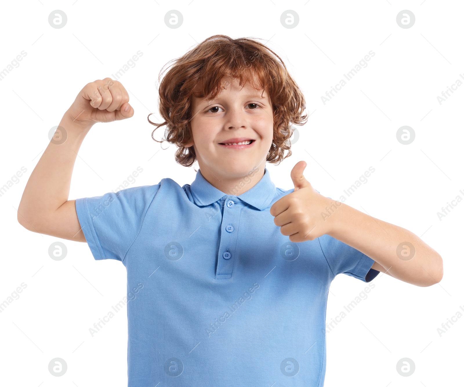 Photo of Strength. Happy little boy showing his biceps and thumbs up on white background