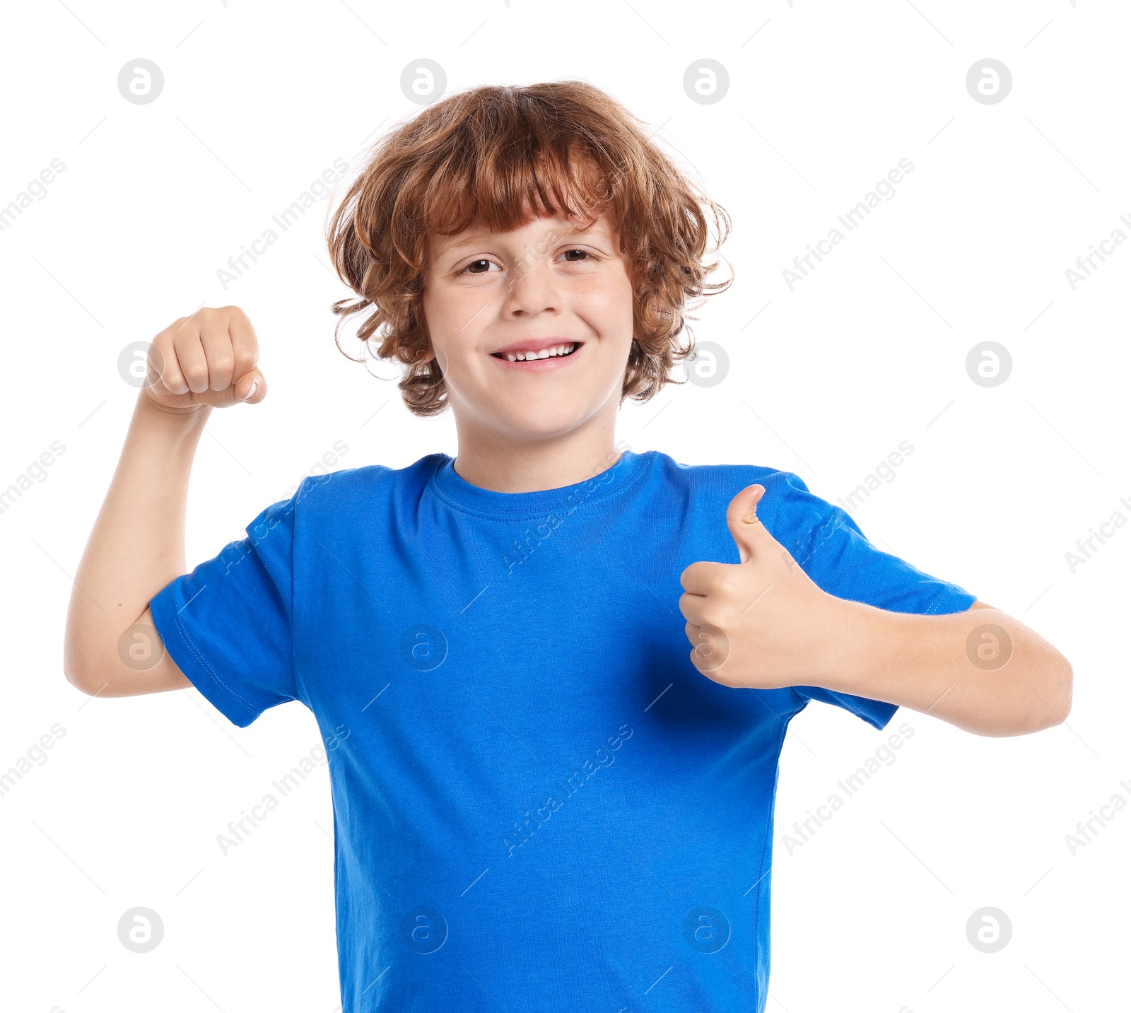 Photo of Strength. Happy little boy showing his biceps and thumbs up on white background