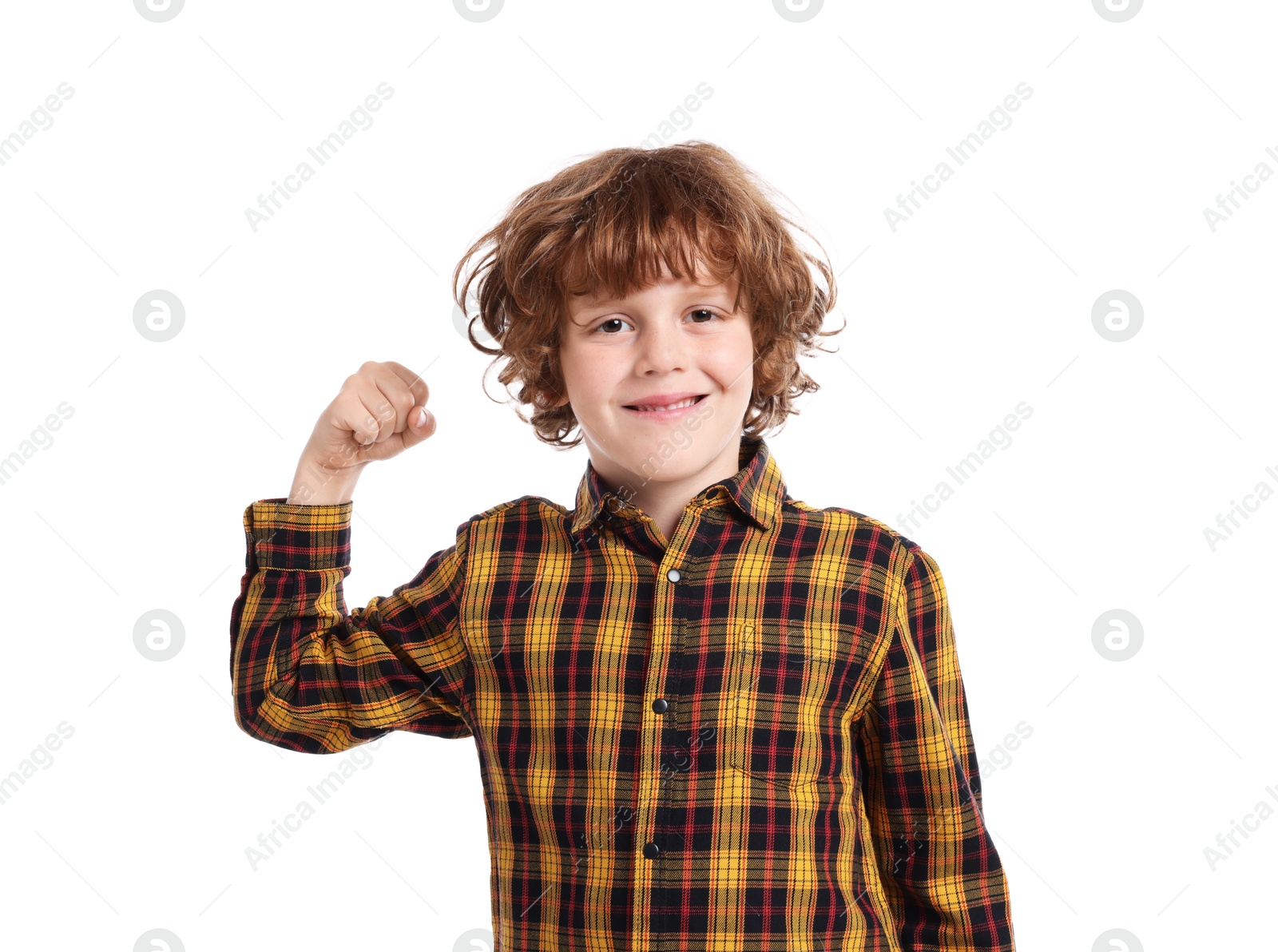 Photo of Strength. Happy little boy showing his biceps on white background