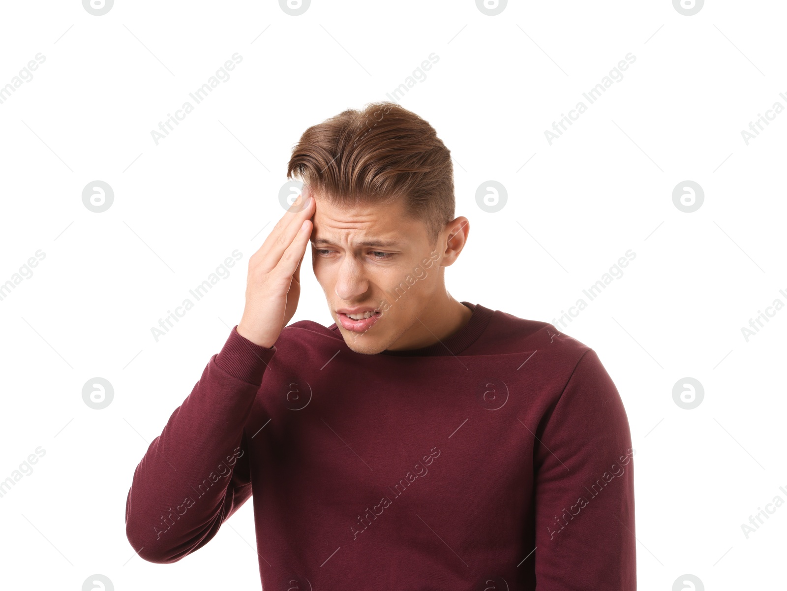 Photo of Young man suffering from headache on white background