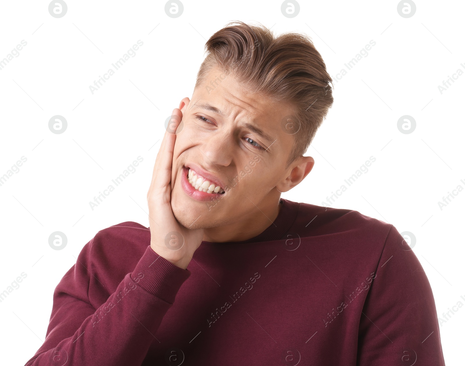 Young man suffering from toothache on white background Photo of Young man suffering from toothache on white background