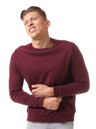 Photo of Young man suffering from stomachache on white background