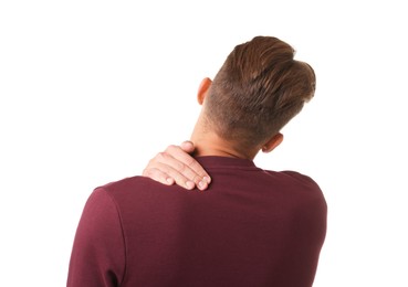 Photo of Man suffering from neck pain on white background, back view