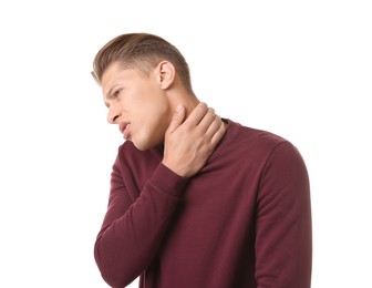 Photo of Young man suffering from neck pain on white background