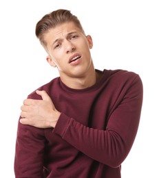 Photo of Young man suffering from shoulder pain on white background