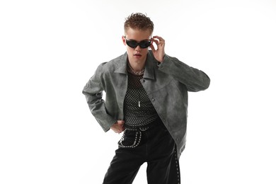 Photo of Handsome young man wearing stylish jacket and sunglasses on white background