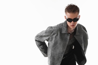 Photo of Handsome young man wearing stylish jacket and sunglasses on white background