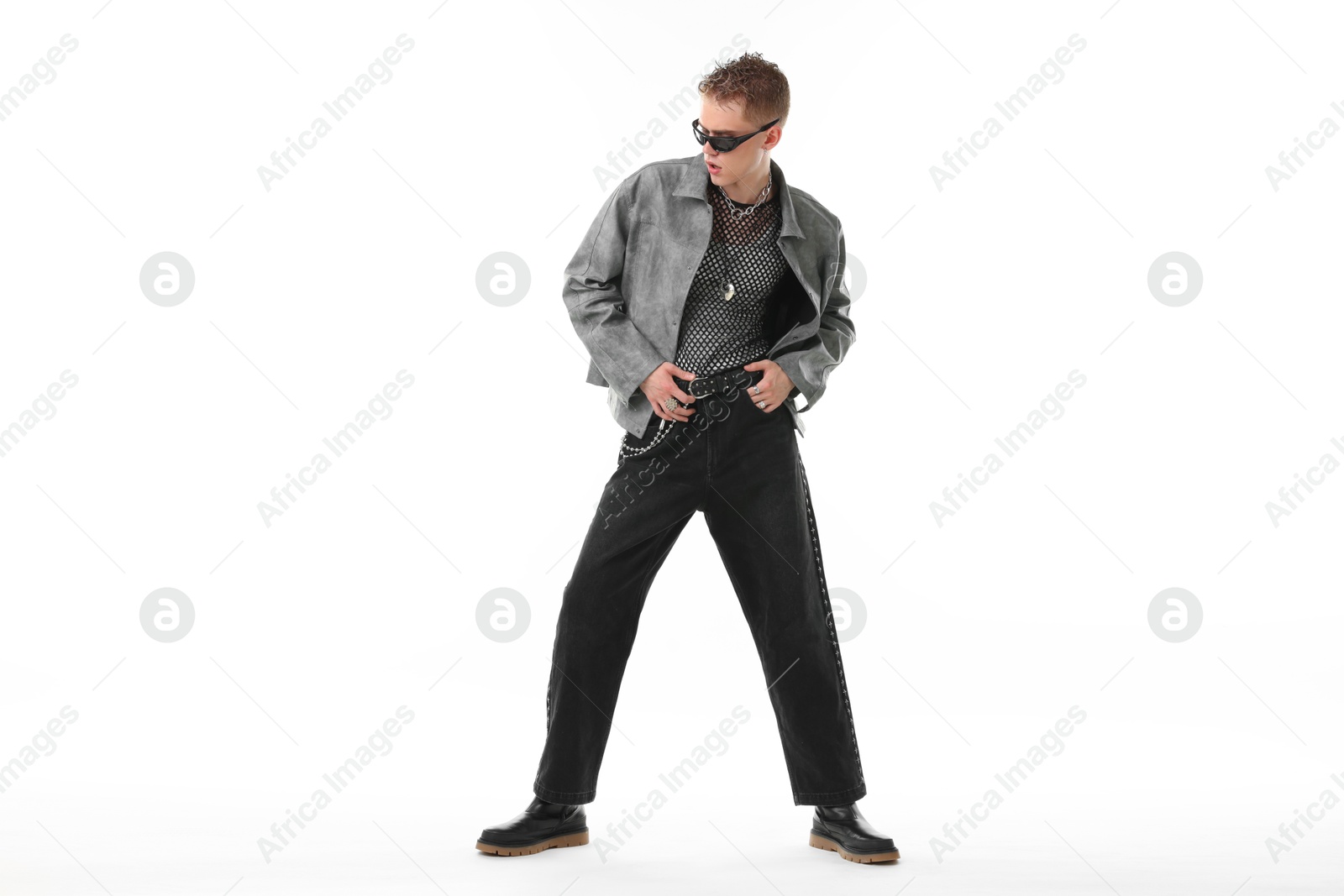 Photo of Handsome young man wearing stylish jacket and sunglasses on white background