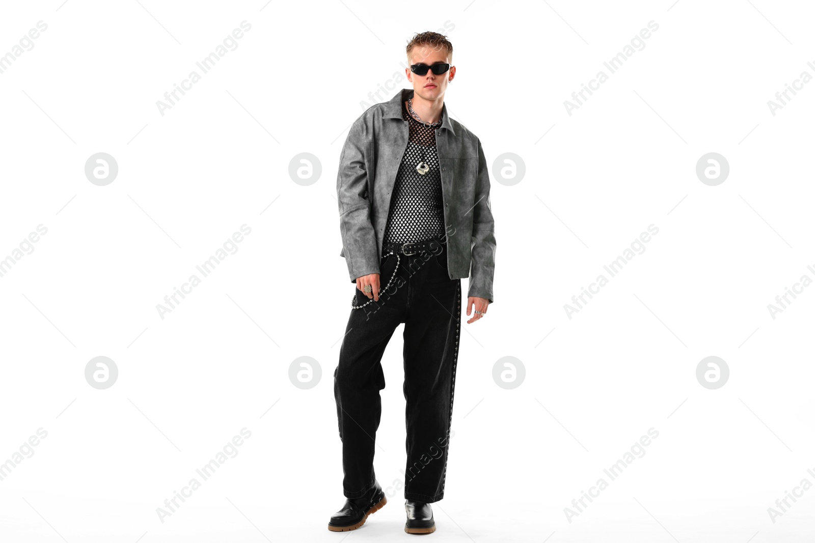 Photo of Handsome young man wearing stylish jacket and sunglasses on white background