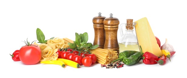 Photo of Different types of pasta and ingredients isolated on white
