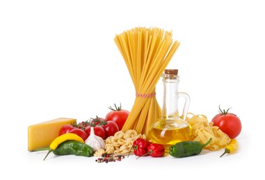 Photo of Different types of pasta and ingredients isolated on white