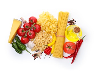 Photo of Different types of pasta and ingredients isolated on white, top view