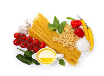 Photo of Different types of pasta and ingredients isolated on white, top view