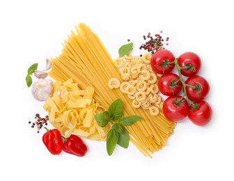Photo of Different types of pasta and ingredients isolated on white, top view