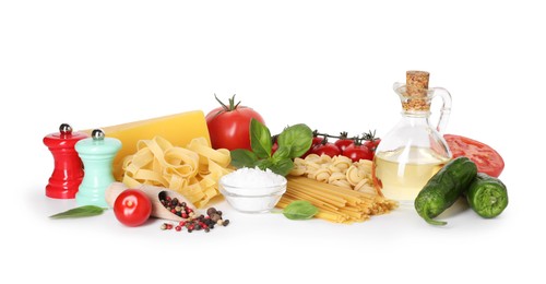 Photo of Different types of pasta and ingredients isolated on white
