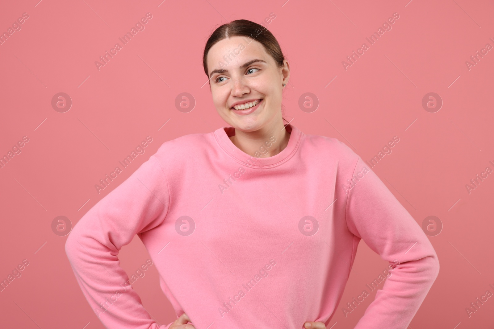 Beautiful woman laughing on pink background. Positive emotion Photo of Beautiful woman laughing on pink background. Positive emotion
