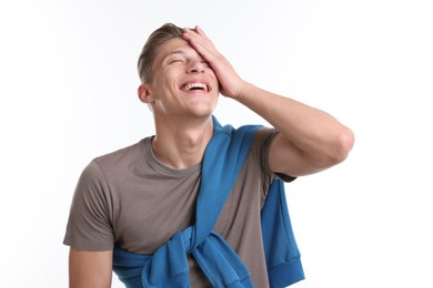 Photo of Handsome man laughing on white background. Positive emotion