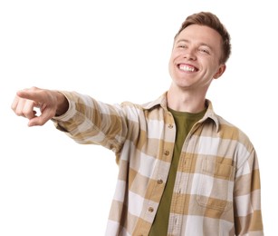 Photo of Handsome man laughing and pointing at something on white background. Positive emotion