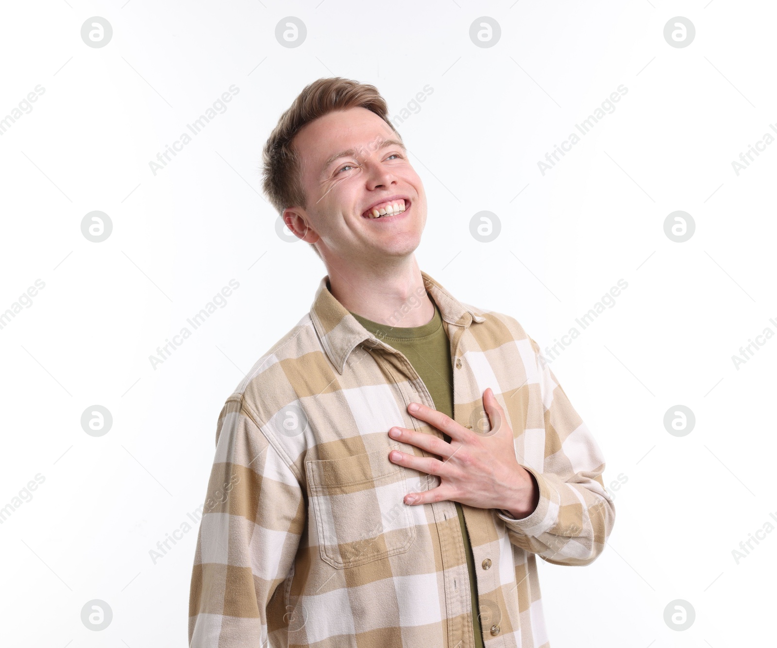 Handsome man laughing on white background. Positive emotion Photo of Handsome man laughing on white background. Positive emotion