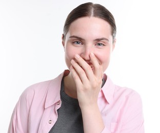 Photo of Beautiful woman laughing on white background. Positive emotion