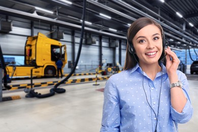 Image of Car service worker with headset against truck at station. Client support
