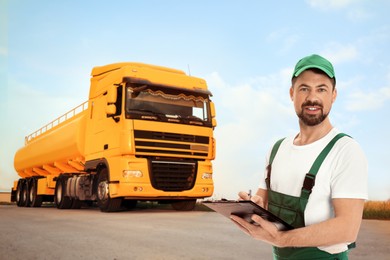 Image of Car service worker with clipboard and truck outdoors