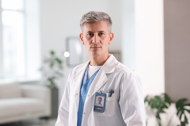Photo of Portrait of doctor in white coat indoors